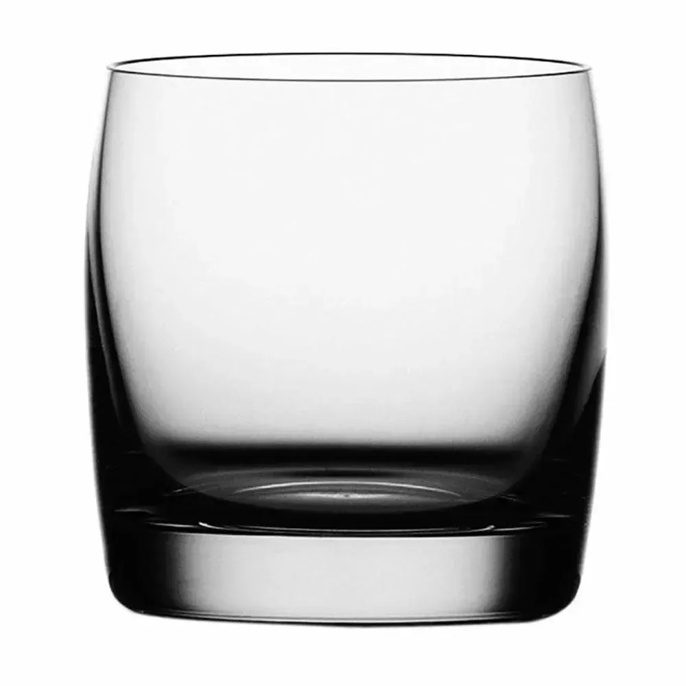 Crystal rocks glass from Libbey with whiskey stones and neat scotch beside a smoking pipe, ideal for classic masculine brandings.