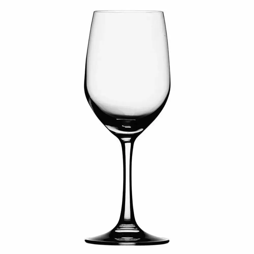 Graceful white wine glass from Libbey with chilled chardonnay and a linen napkin, styled for refined wine branding and a soft lifestyle setting.