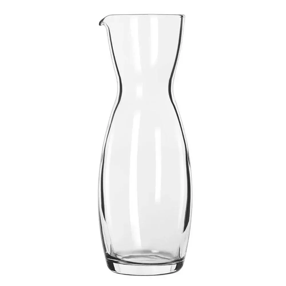 Classic round glass carafe from Libbey, ideal for stylish wine, juice, or water service at hotel dining tables or restaurant beverage stations.