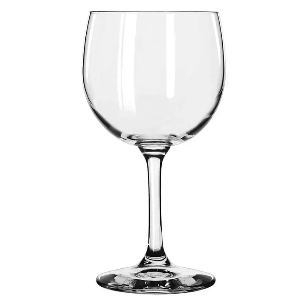 Thick stem wine glass from Libbey with a wide base, built for durability and ideal for elegant hotel dining rooms and full service restaurants.