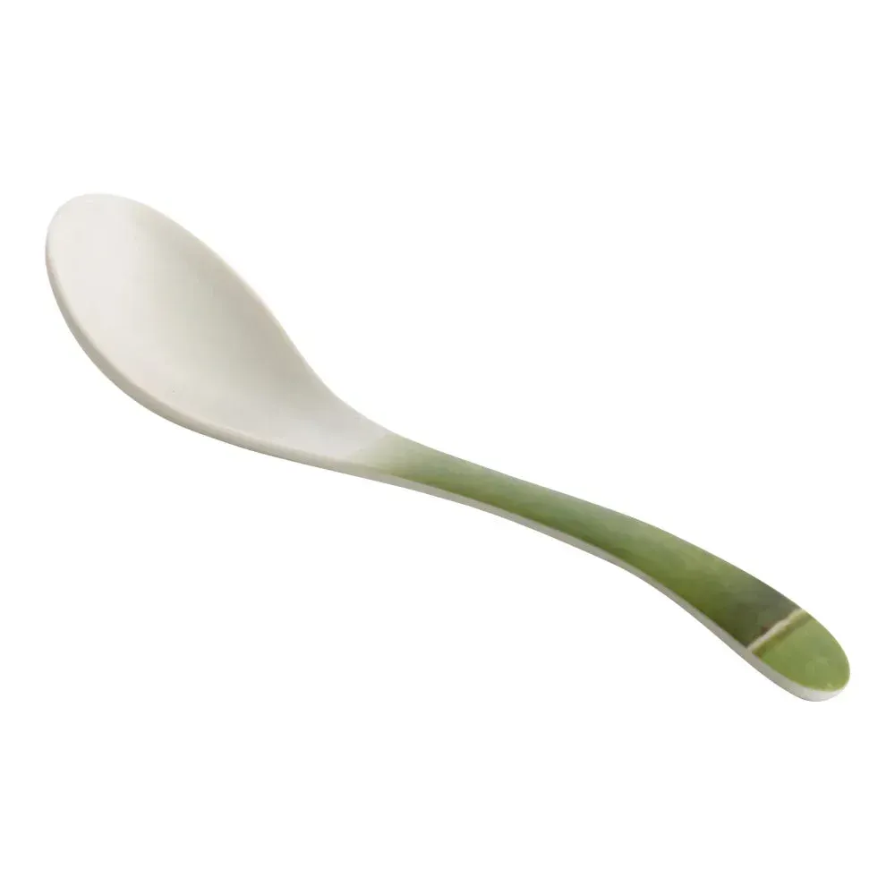 Bamboo style melamine spoon from Yanco China with a smooth ergonomic handle and clean finish, designed for easy food service in buffets.