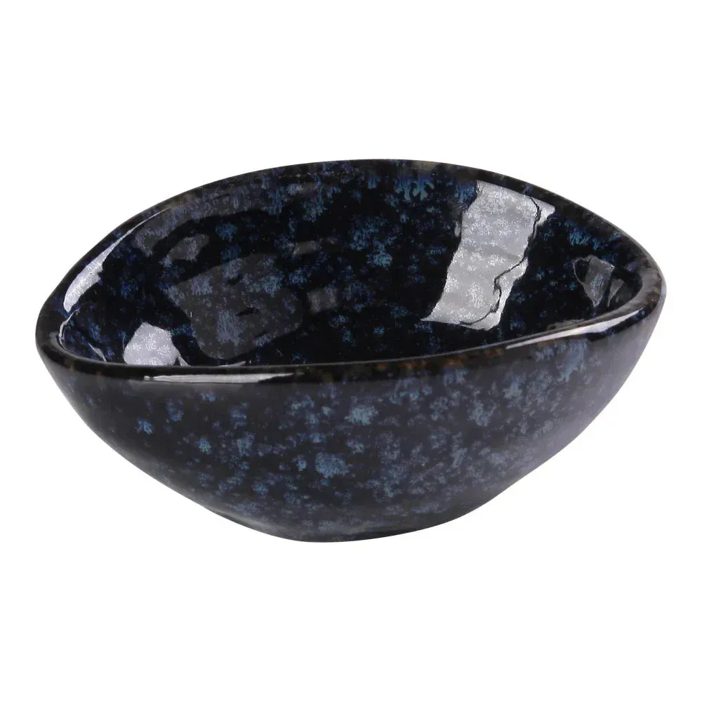 Small blue olive bowl by Yanco China with decorative star accents, suitable for serving olives, nuts, or small finger foods with added charm.