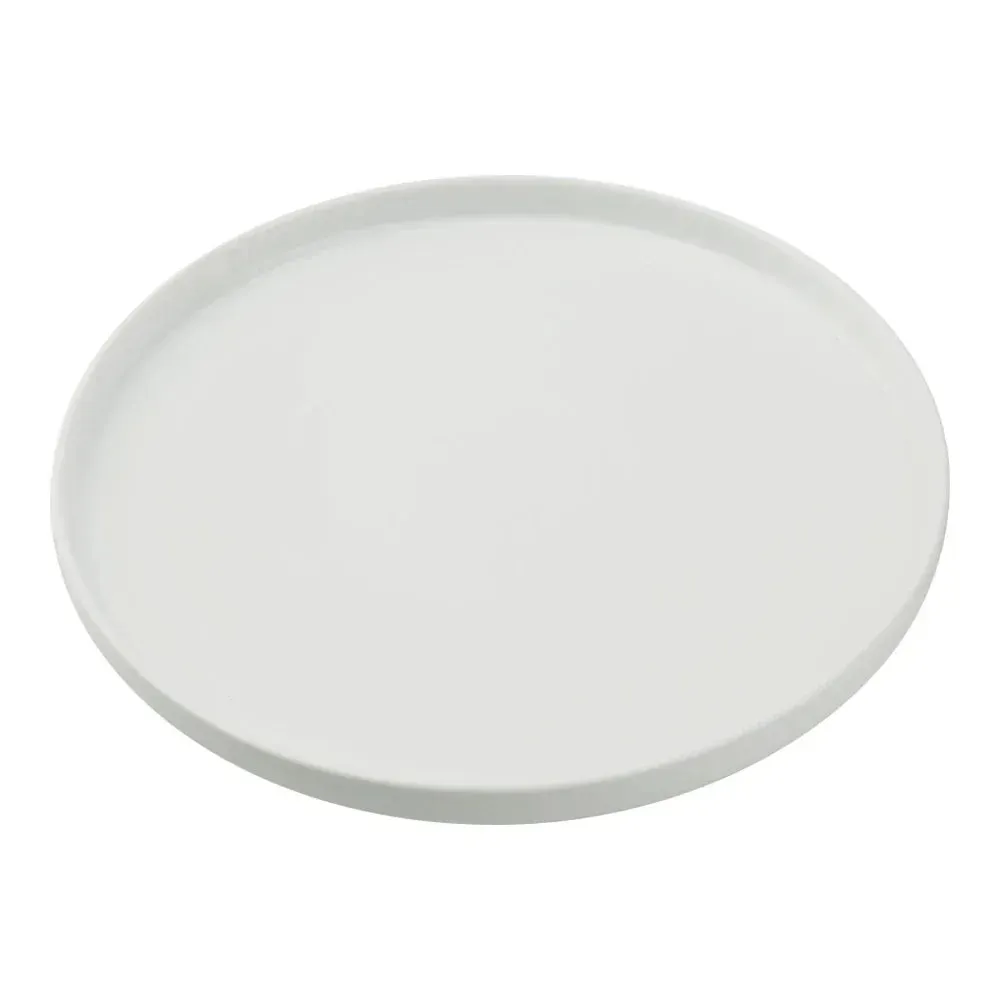 Yanco China compact round white porcelain plate with upright rim and clean edges, designed for bread, desserts, or side accompaniments stylishly.
