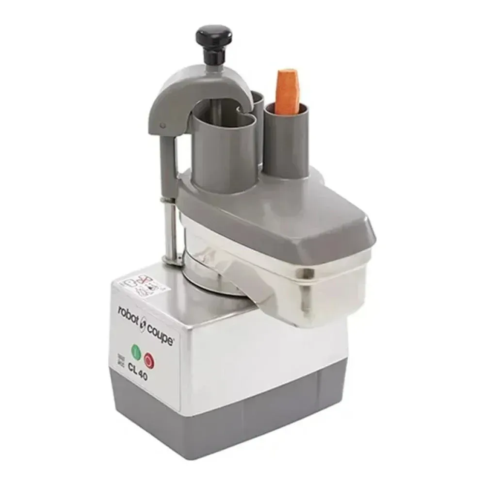 Robot Coupe compact commercial food processor with two stainless steel discs, ideal for quick slicing, shredding, and chopping in busy kitchens.