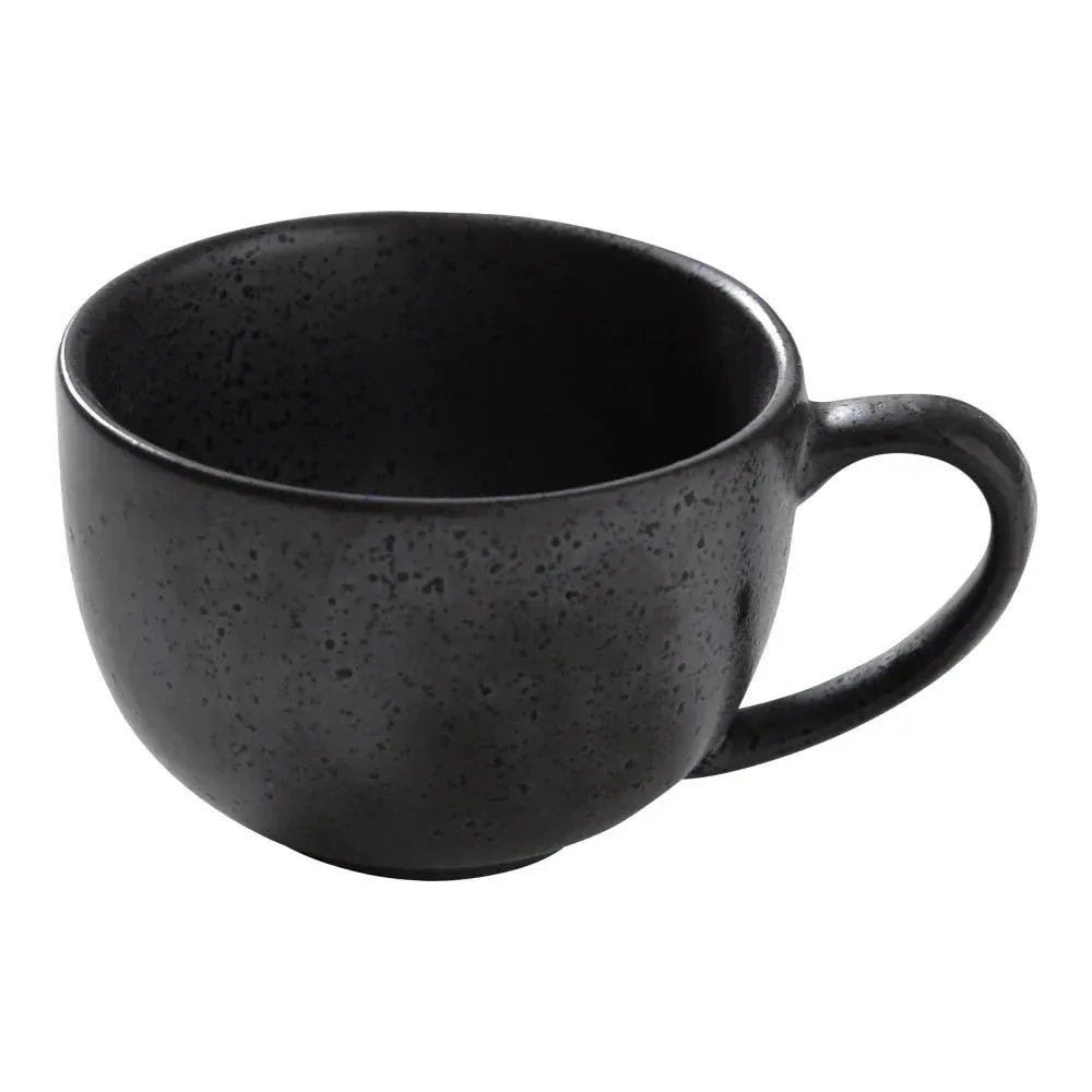 Matte black porcelain cup by Yanco China, smooth matte glaze, perfect for espresso or sake, chip-resistant for minimalist café or bar service.