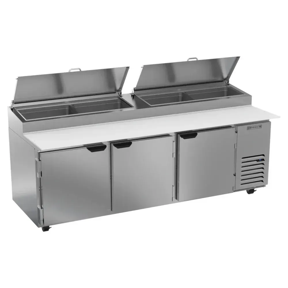 Pizza prep table from Beverage-Air with three door refrigerated base and pan rail top, offering quick access to fresh toppings in kitchens.