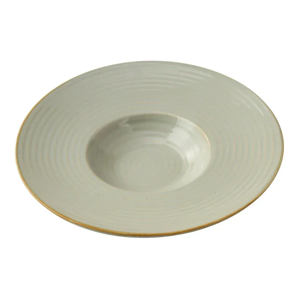 Wide twelve ounce Golden Coast dessert plate from Yanco China, with concentric rings that elegantly showcase individual plated desserts.