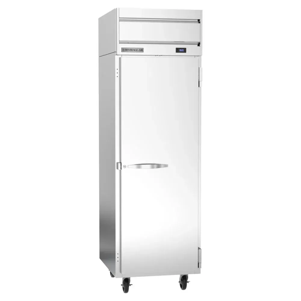 Beverage-Air compact solid-door reach-in refrigerator in stainless steel tucked beside prep station, gleaming under warm kitchen lighting.