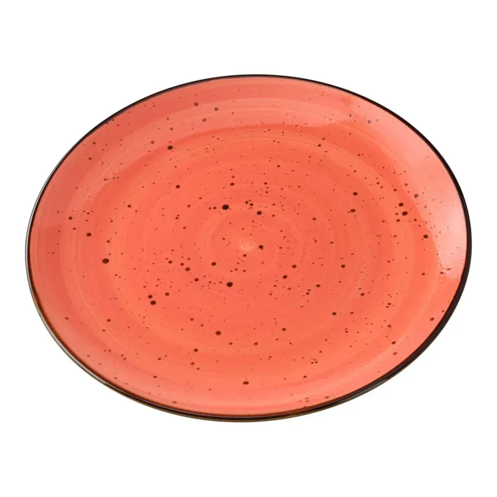 Medium round Yanco China coupe plate with speckled reactive coral glaze, ideal for artisanal and elegant presentation of entrees.
