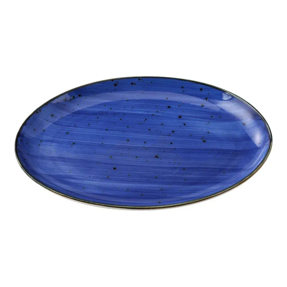 Tiny oval coupe plate by Yanco China with a rustic speckled blue finish, an artistic choice for bread, butter, or amuse-bouche service.