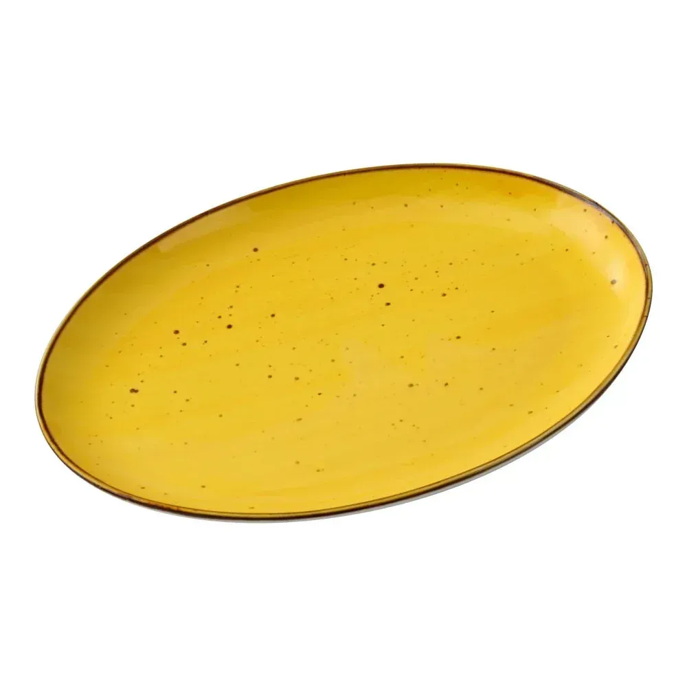 Small oval coupe plate from Yanco China with a speckled yellow finish, offering an artistic touch for desserts, bread, or amuse-bouche.