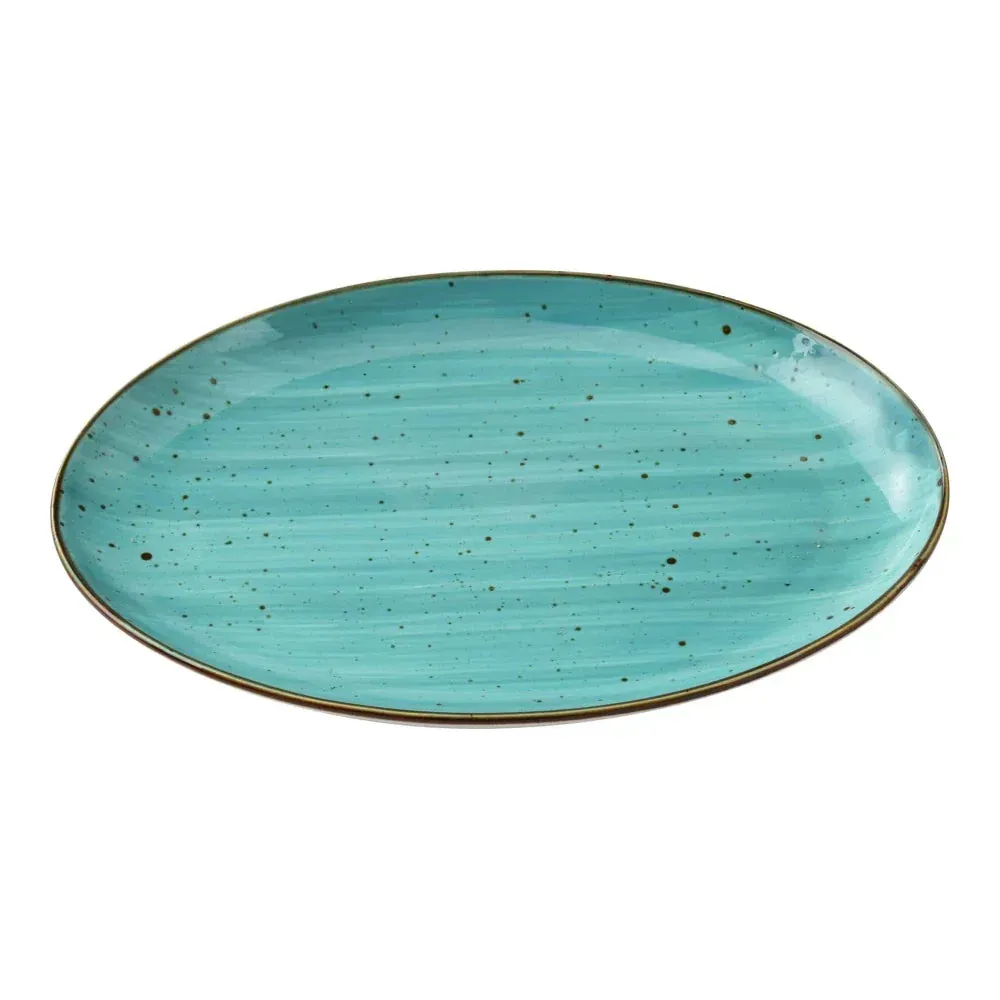 Small oval coupe dinner platter with speckled turquoise glaze by Yanco China, perfect for presenting appetizers or desserts with an artisanal touch.