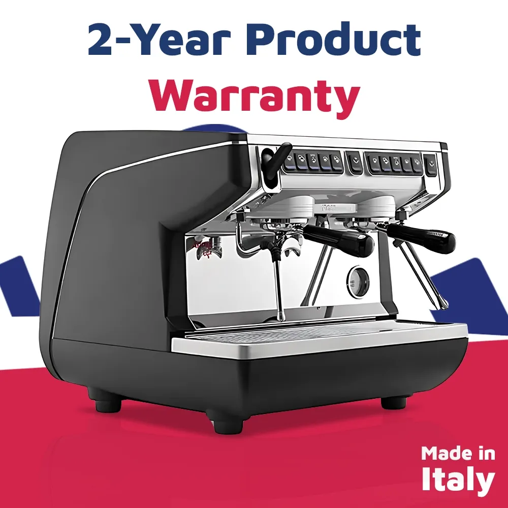 Nuova Simonelli advanced espresso machine with auto steam wand, lit workspace, and stainless body on clean bar with frothing pitcher nearby.