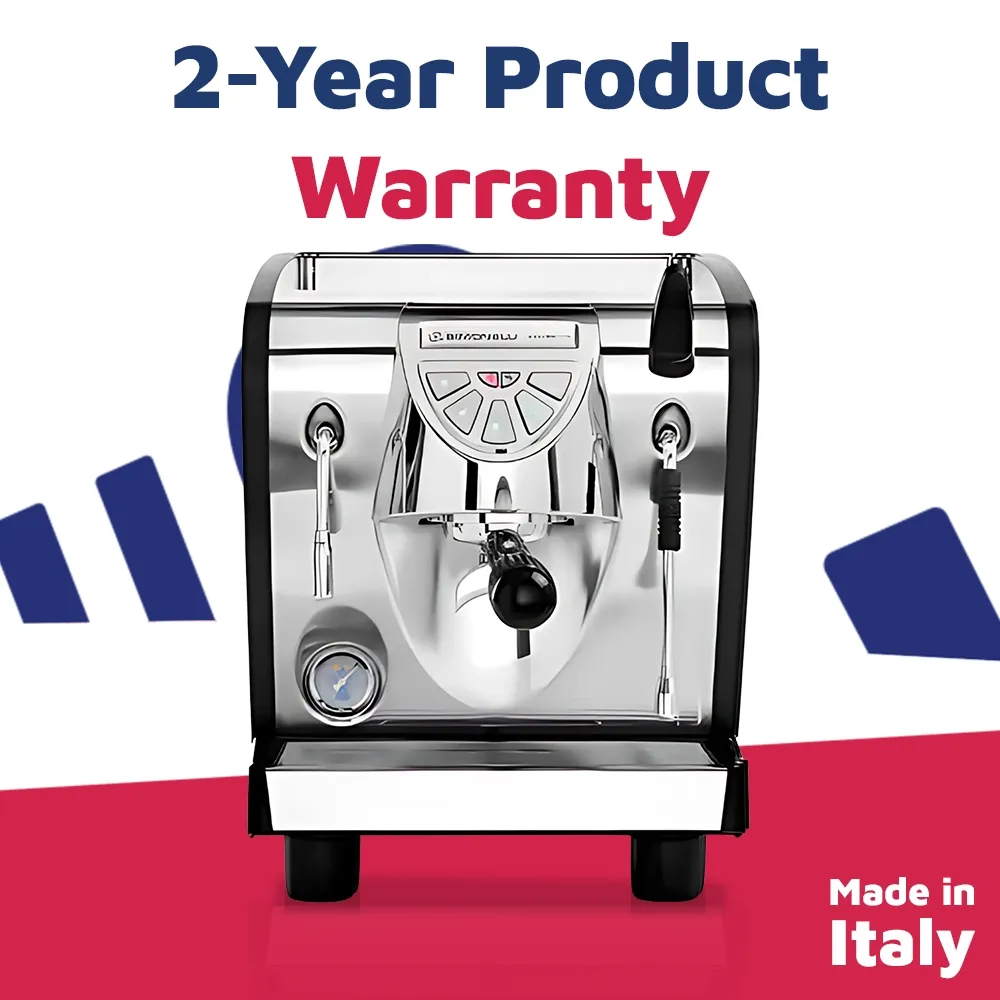 Nuova Simonelli elegant stainless espresso machine with backlit buttons and chrome accents on wood counter creates café-style crema and rich coffee.