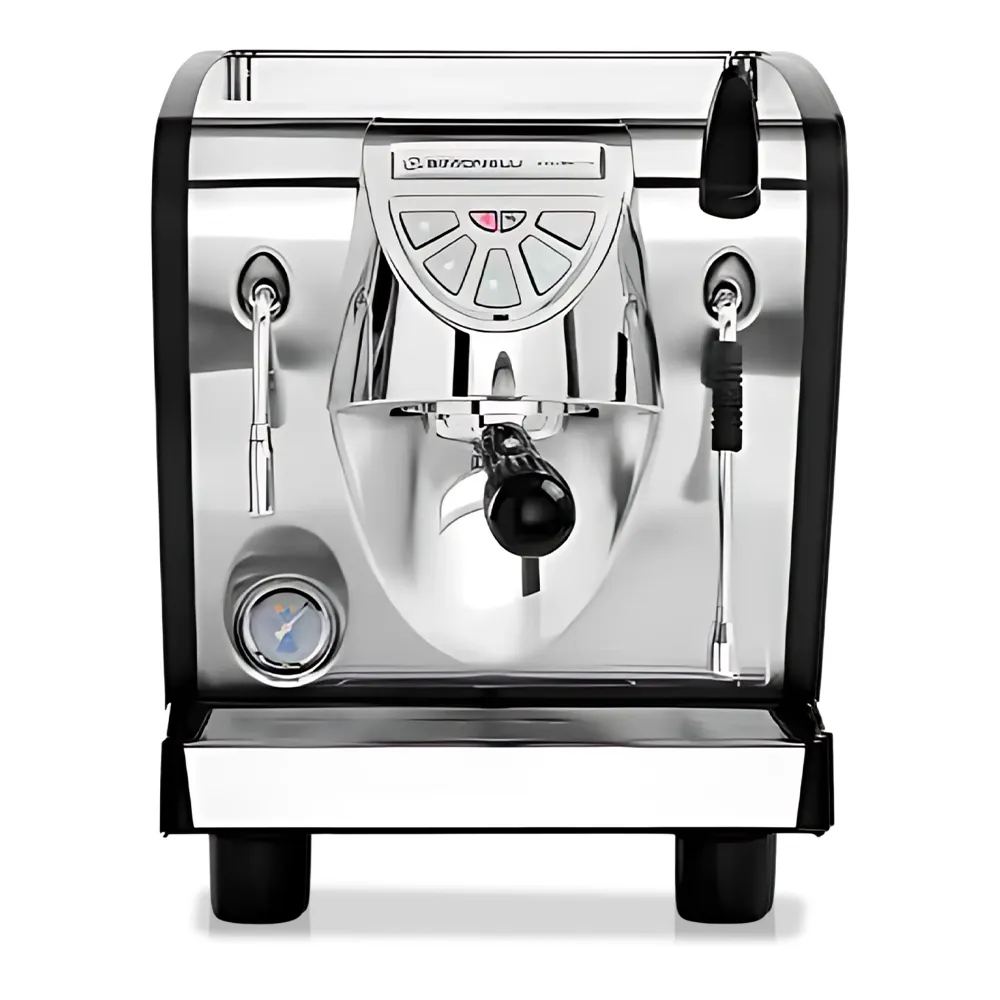 Nuova Simonelli compact espresso machine in brushed metal with touch panel and lit brew group sits on marble counter with cups ready to brew.