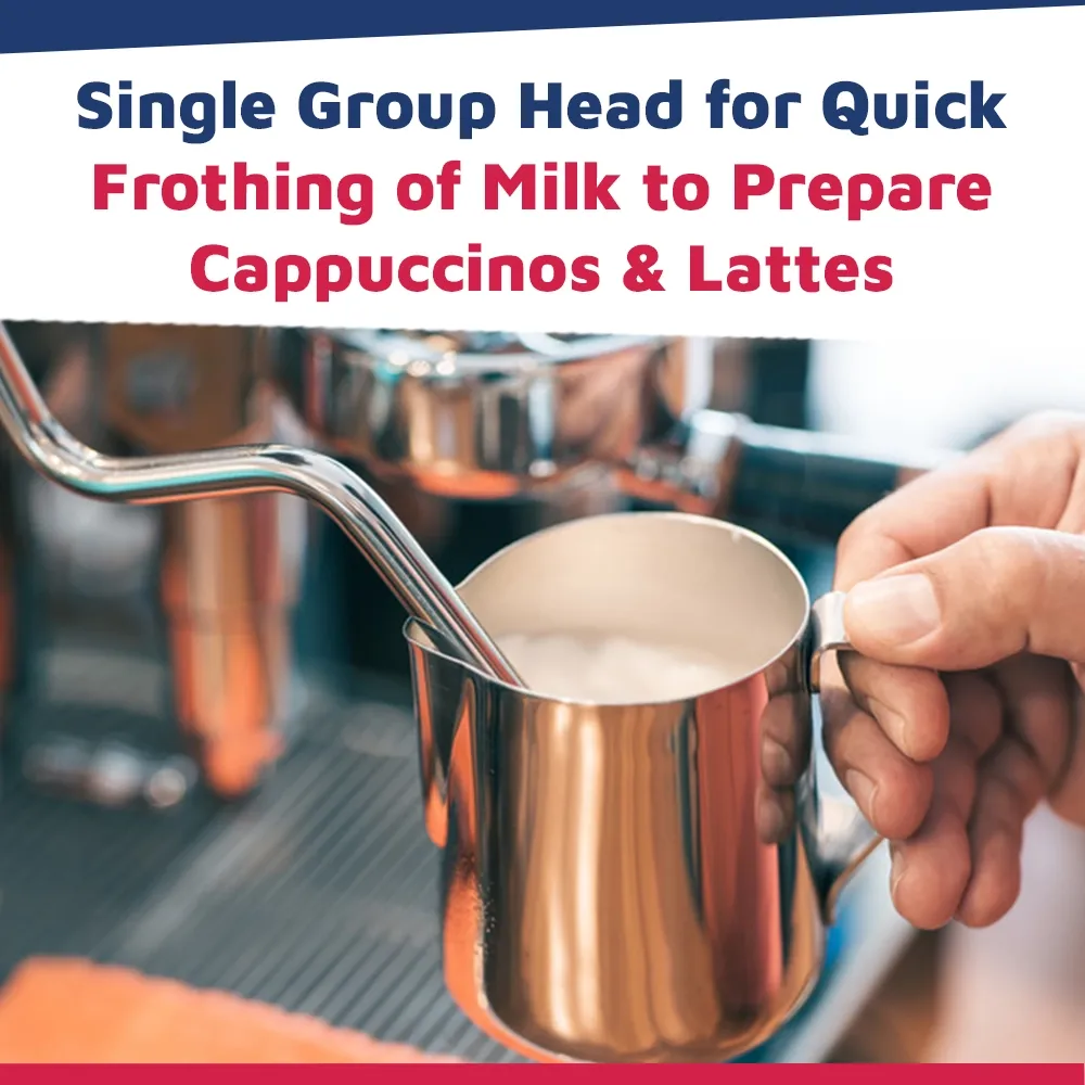 Nuova Simonelli pour-over espresso machine in glossy black with curved stainless sides sits on a wooden bar under soft morning café lighting.