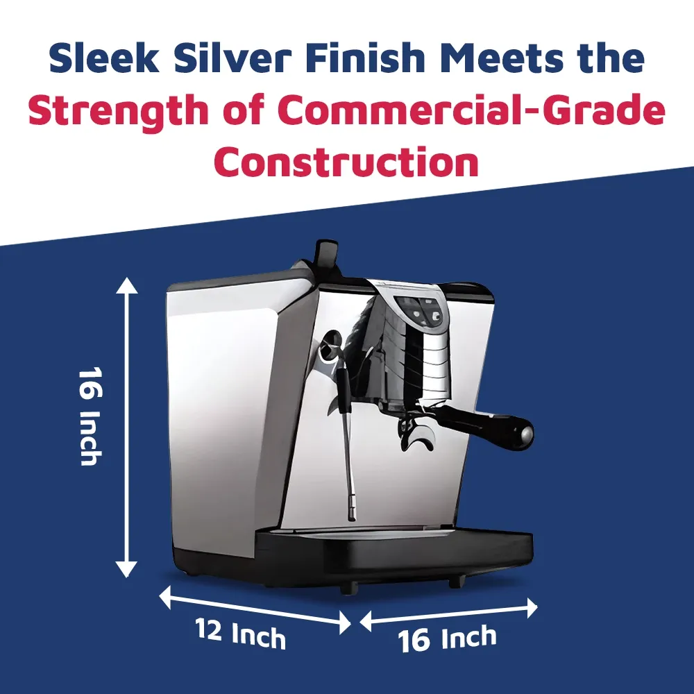 Nuova Simonelli pour-over espresso machine in glossy black with curved stainless sides sits on a wooden bar under soft morning café lighting.