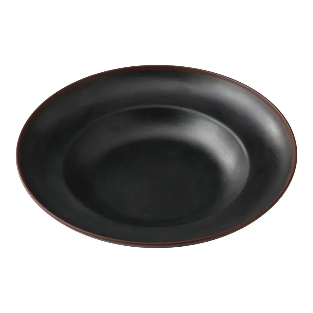 Yanco China deep black pasta bowl with curved sides and glossy finish, ideal for pasta, salads, or grain dishes presented in an appealing manner.