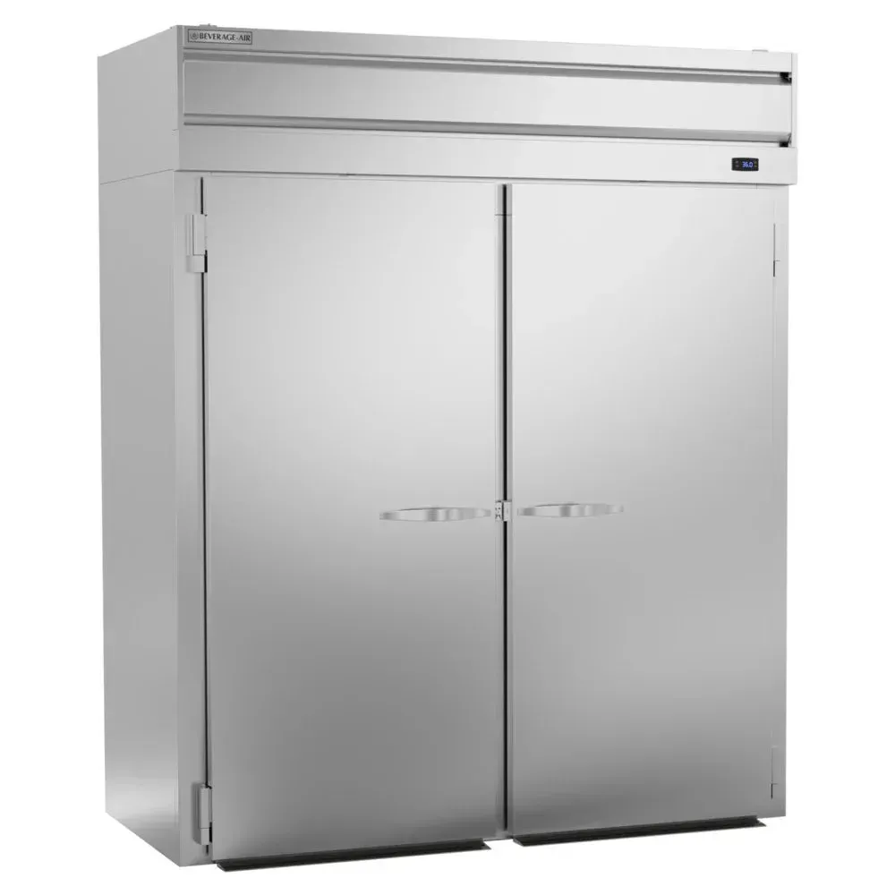 Beverage-Air two-section roll-in refrigerator with solid doors, built to handle full-size food racks for high-volume chilled storage needs.