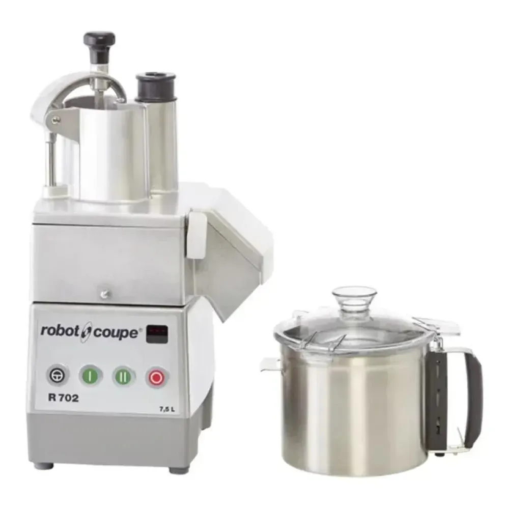 Robot Coupe food processor with vegetable prep set and stainless bowl, perfect for preparing delicate herbs and root vegetables in busy kitchens.
