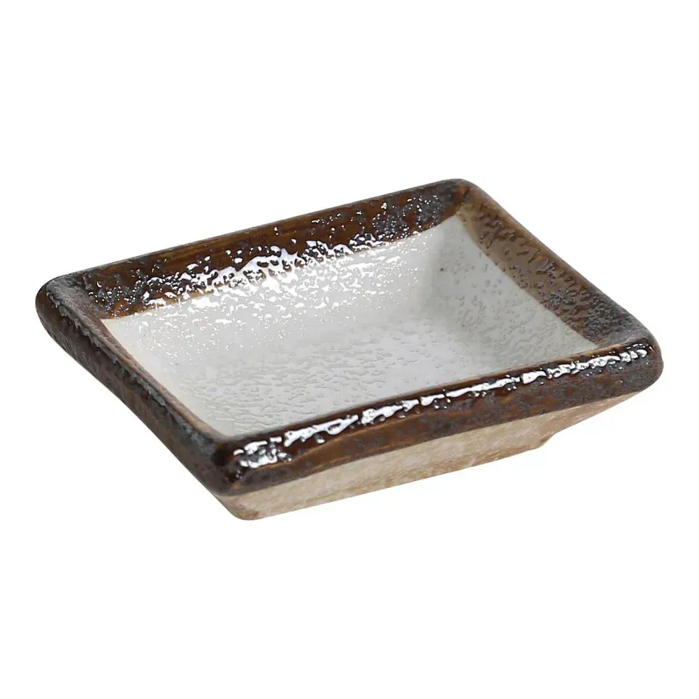 Yanco two-tone rectangular sauce dish, versatile and sturdy, ideal for serving dips, sauces, or condiments in restaurants and cafes.