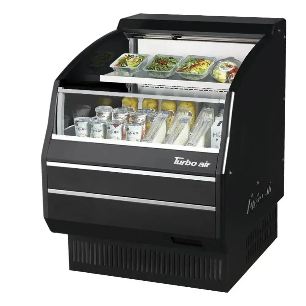 Compact curved display case by Turbo Air, designed for small retail spaces, offering efficient cooling and clean product visibility.