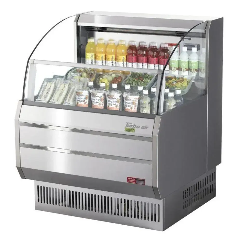 Compact stainless steel open display case by Turbo Air, designed for space limited cafés and stores needing efficient cold merchandising.