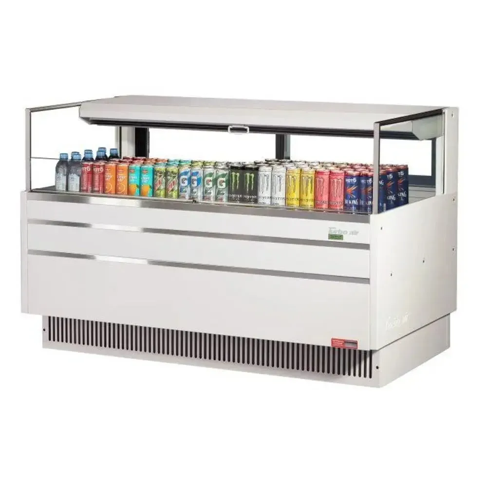 Low profile horizontal open merchandiser by Turbo Air with a glass canopy, single shelf, LED lighting, and assorted drinks on display.
