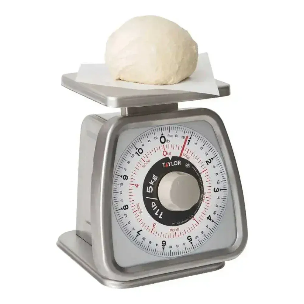 Taylor mechanical portion control scale with clear dial, durable and precise for consistent kitchen portioning in daily foodservice operations.