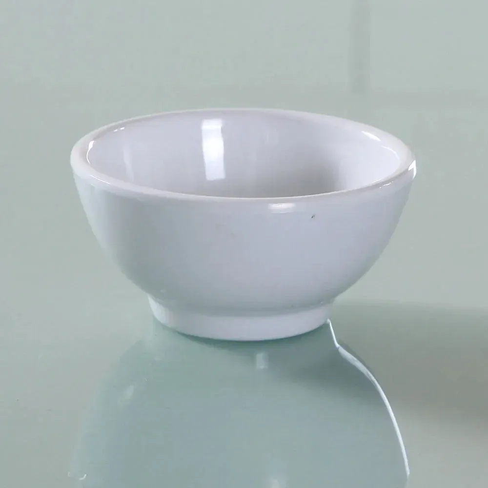 Yanco China white melamine small sauce bowl, perfect for serving condiments, dips, or dressings in style while complementing any table setup.