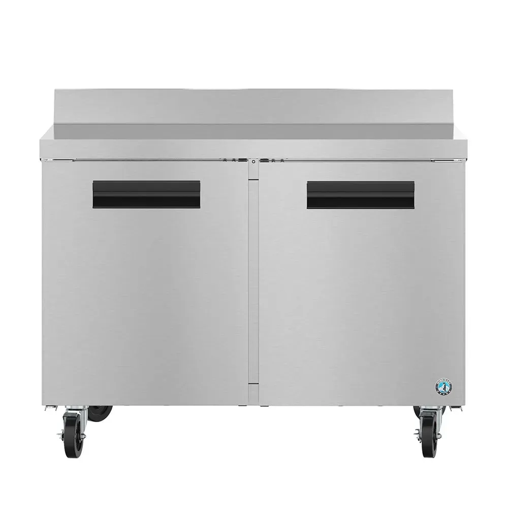 Stainless steel worktop freezer by Hoshizaki America with two sections and two doors, offering organized storage for commercial use.