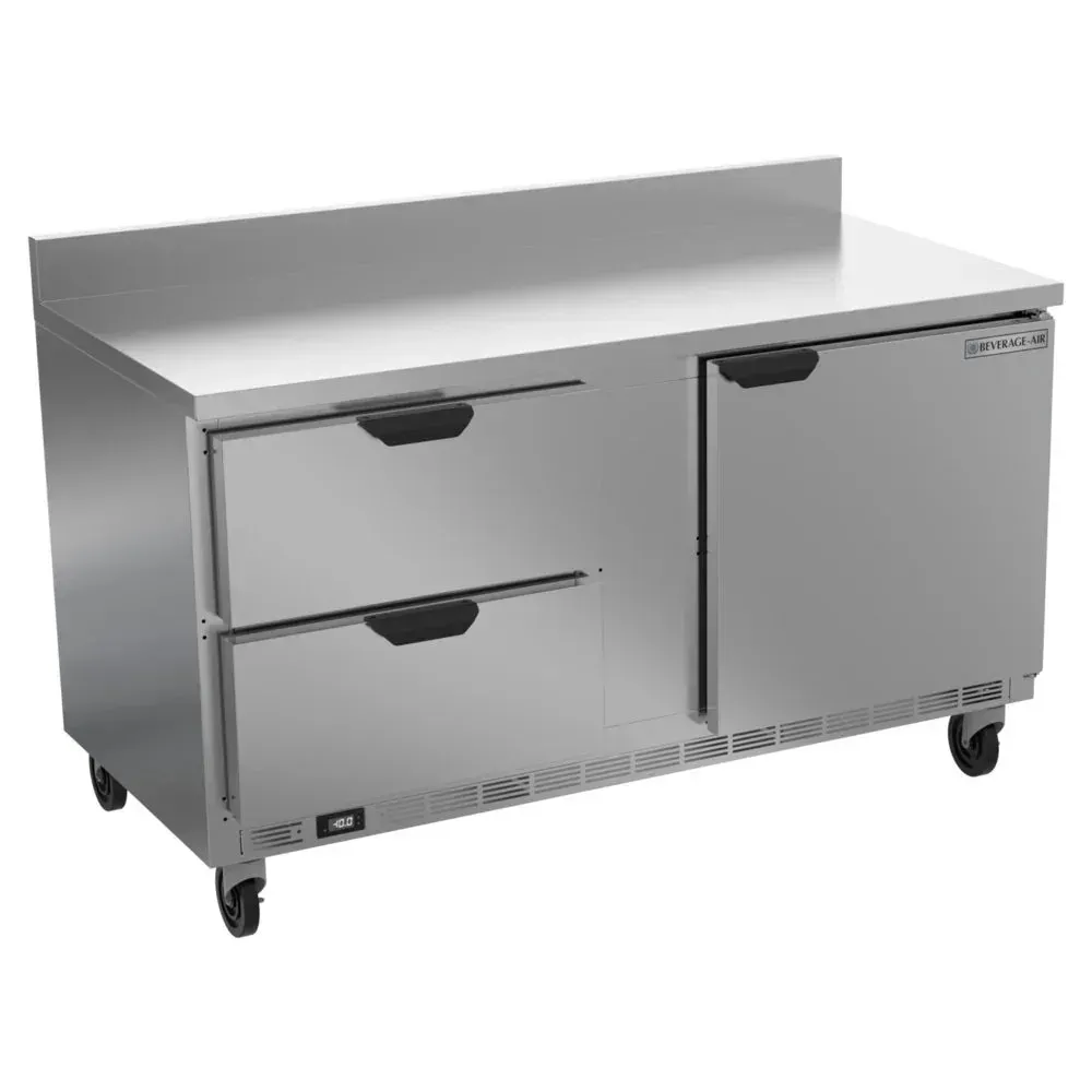 Two-drawer, one-door worktop freezer with backsplash shields walls; Beverage-Air stainless under-counter unit offers frozen storage for busy cafes.
