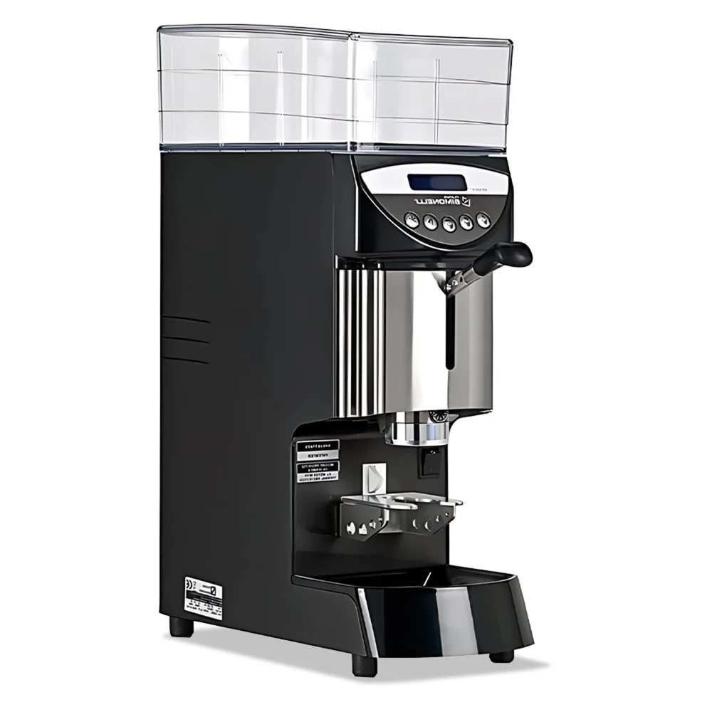 Nuova Simonelli Mythos Plus black espresso grinder with chrome accents and a large hopper sits on a café counter next to portafilters and stacked cup.