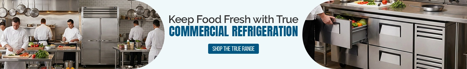 Professional chefs working in a commercial kitchen with True commercial refrigeration, stainless steel prep tables, and refrigerated drawers for fresh food storage in restaurants and hotels.