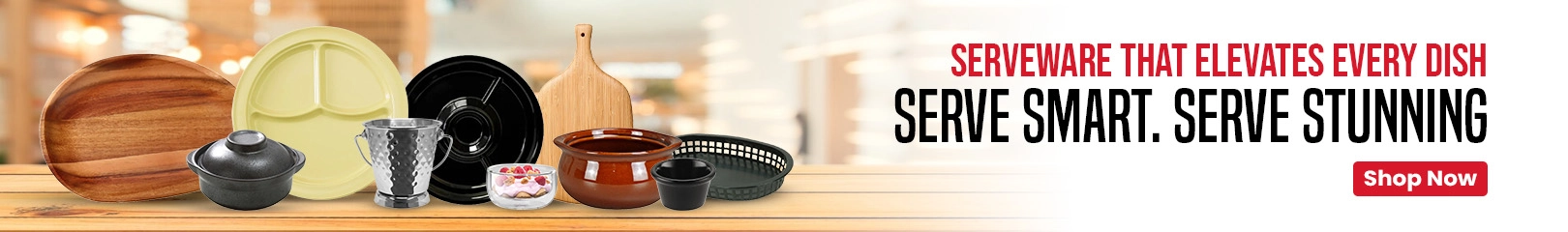 A variety of serveware including wooden trays, sectioned plates, bowls, and metal tumblers placed on a wood table for stylish food service.