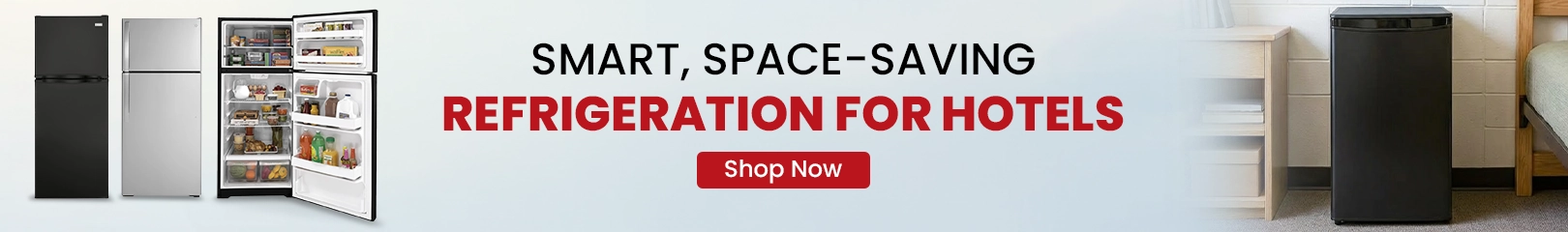 Compact in room refrigerator placed inside a hotel guest room cabinet